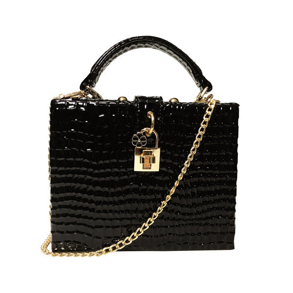 Wild Elegance Python Print Handbag for a Stylish Statement