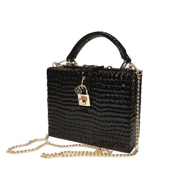 Wild Elegance Python Print Handbag for a Stylish Statement