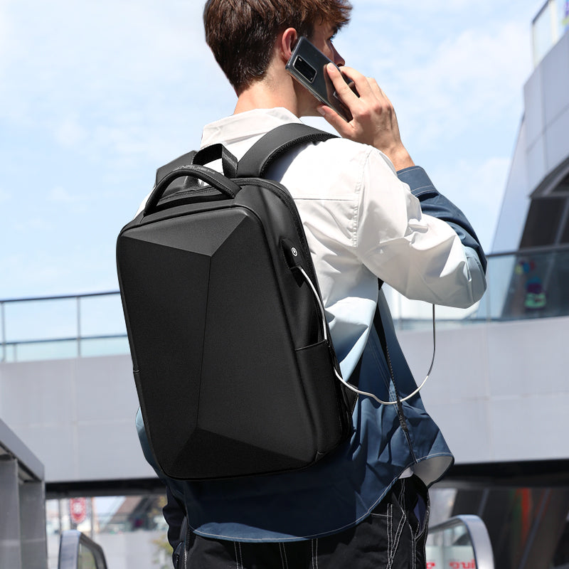 "Newly Designed Men's Business Travel Backpack with Anti-Theft and Waterproof Features, USB Charging Port, and Brand Logo"